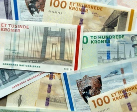 Danske pengesedler i en bunke med en 1000 kr. seddel øverst.
