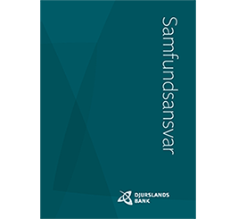 Et eksemplar af Samfundsansvarsrapport fra Djurslands Bank. 